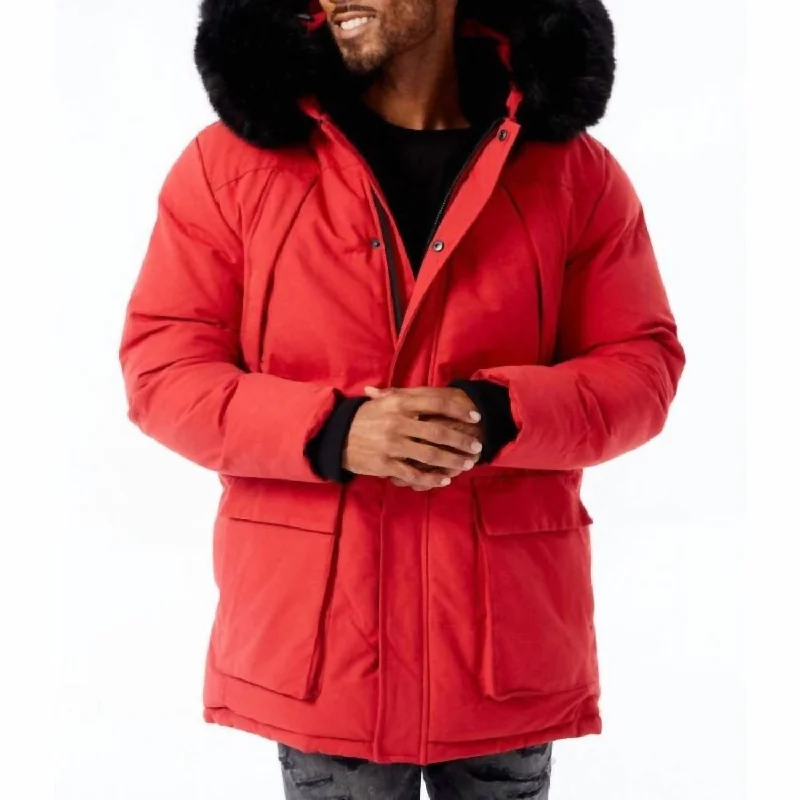 Slim - fit men coats in navy blue for a classic and sophisticated appearanceSlim - fit men coats in navy blue for a classic and sophisticated appearanceBismarck Fur Lined Parka Jacket In Red